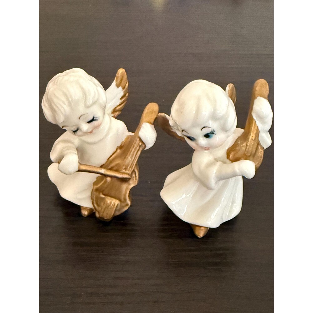 Vintage porcelain white and gold wide blue eyed angels